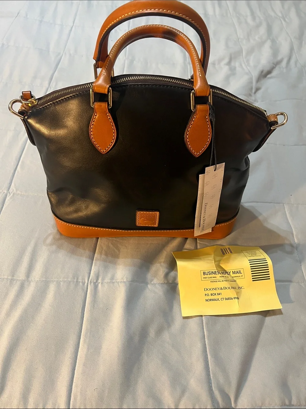 Dooney & Bourke Beige Canvas Messenger Bag with Tan Leather Trim